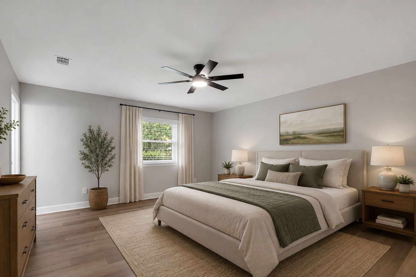 The primary bedroom from the opposite corner, virtually staged